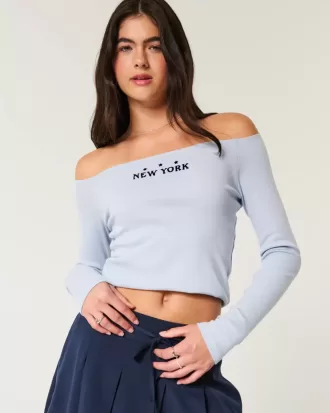 Blusa con hombros descubiertos y estampado neoyorquino fácil