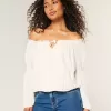 Blusa de manga larga con hombros descubiertos fácil de llevar