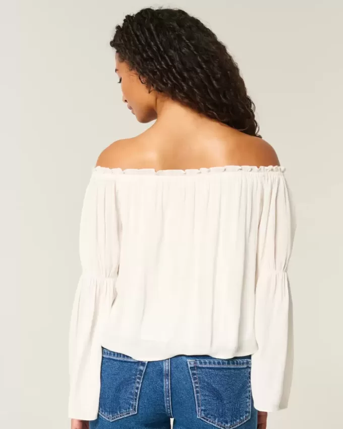 Blusa de manga larga con hombros descubiertos fácil de llevar