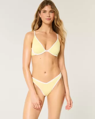 Braguita de bikini atrevida con cintura en V y pierna alta acanalada
