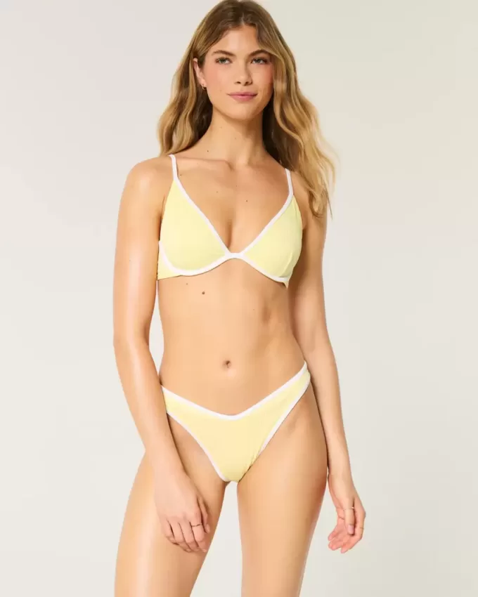 Braguita de bikini atrevida con cintura en V y pierna alta acanalada Braguita de bikini atrevida con cintura en V y pierna alta acanalada