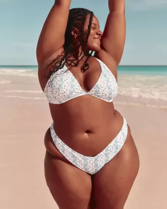 Braguita de bikini atrevida con cintura en V y pierna alta acanalada