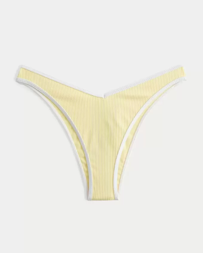 Braguita de bikini atrevida con cintura en V y pierna alta acanalada Braguita de bikini atrevida con cintura en V y pierna alta acanalada