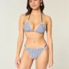 Braguita de bikini atrevida con doble tirante y ribete estilo crochet Braguita de bikini atrevida con doble tirante y ribete estilo crochet