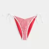 Braguita de bikini atrevida con lazo lateral Braguita de bikini atrevida con lazo lateral