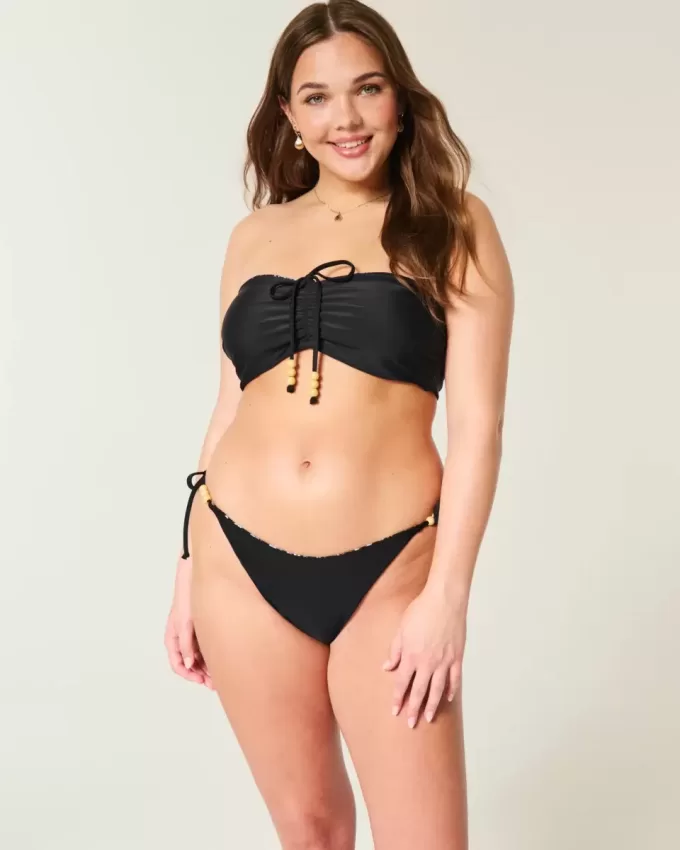 Braguita de bikini atrevida con lazo lateral reversible Braguita de bikini atrevida con lazo lateral reversible