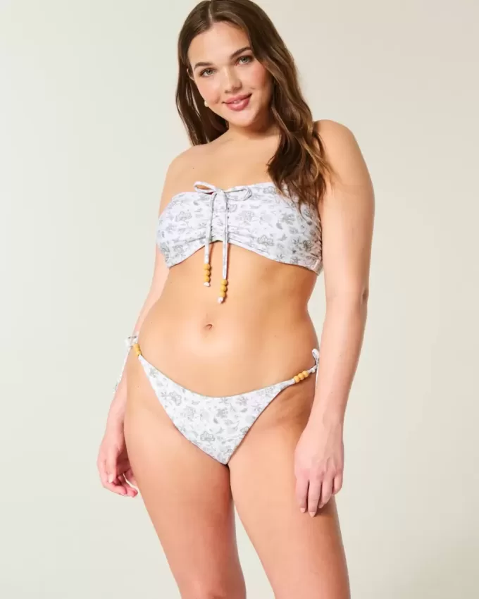 Braguita de bikini atrevida con lazo lateral reversible Braguita de bikini atrevida con lazo lateral reversible