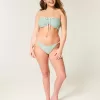 Braguita de bikini atrevida con lazo lateral reversible Braguita de bikini atrevida con lazo lateral reversible