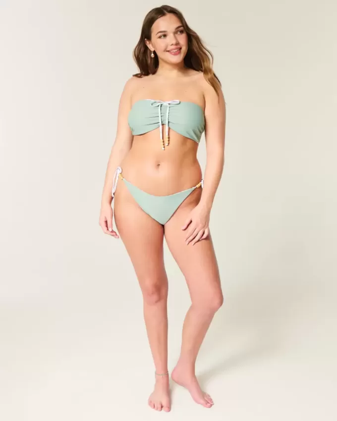Braguita de bikini atrevida con lazo lateral reversible Braguita de bikini atrevida con lazo lateral reversible