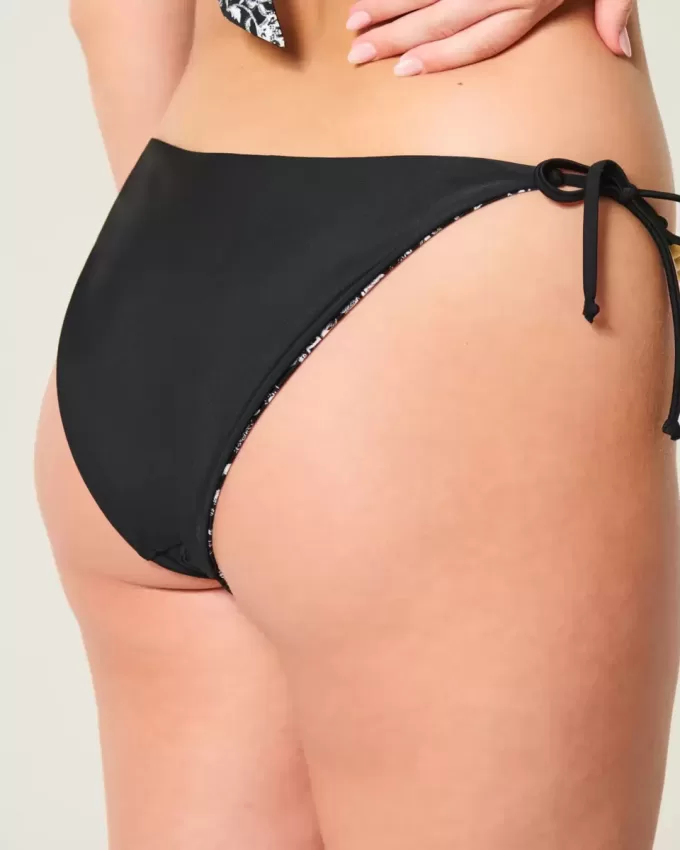 Braguita de bikini atrevida con lazo lateral reversible Braguita de bikini atrevida con lazo lateral reversible
