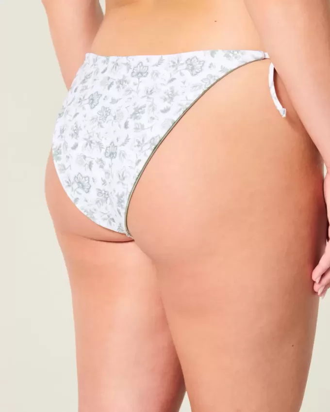 Braguita de bikini atrevida con lazo lateral reversible Braguita de bikini atrevida con lazo lateral reversible