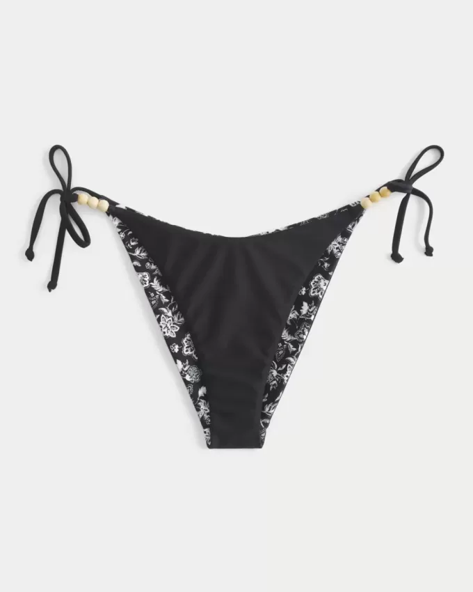 Braguita de bikini atrevida con lazo lateral reversible Braguita de bikini atrevida con lazo lateral reversible