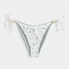 Braguita de bikini atrevida con lazo lateral reversible Braguita de bikini atrevida con lazo lateral reversible