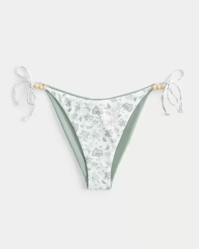 Braguita de bikini atrevida con lazo lateral reversible Braguita de bikini atrevida con lazo lateral reversible