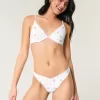 Braguita de bikini atrevida con ojales y pierna alta Braguita de bikini atrevida con ojales y pierna alta