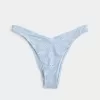 Braguita de bikini atrevida con ojales y pierna alta Braguita de bikini atrevida con ojales y pierna alta