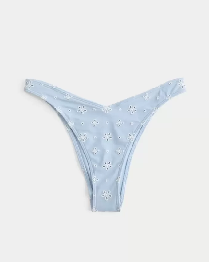 Braguita de bikini atrevida con ojales y pierna alta Braguita de bikini atrevida con ojales y pierna alta