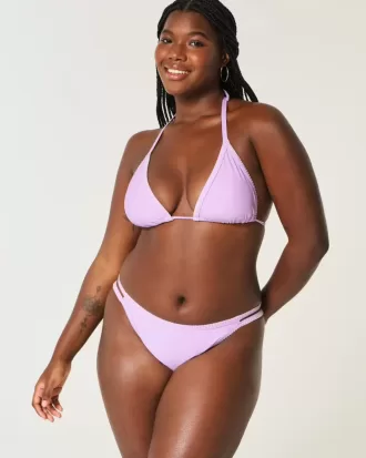 Braguita de bikini atrevida con tiras y bordado de pierna alta