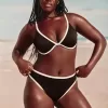 Braguita de bikini atrevida, de cintura alta y pierna alta con curvas Braguita de bikini atrevida, de cintura alta y pierna alta con curvas