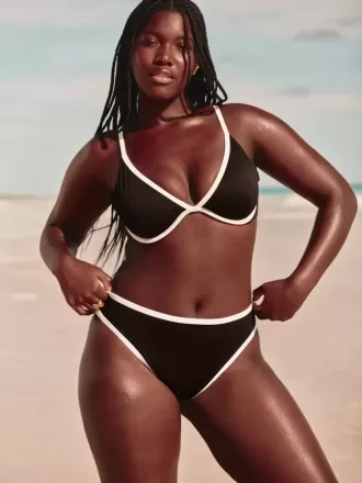 Braguita de bikini atrevida, de cintura alta y pierna alta con curvas Braguita de bikini atrevida, de cintura alta y pierna alta con curvas