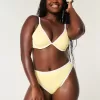 Braguita de bikini atrevida, de cintura alta y pierna alta con curvas Braguita de bikini atrevida, de cintura alta y pierna alta con curvas