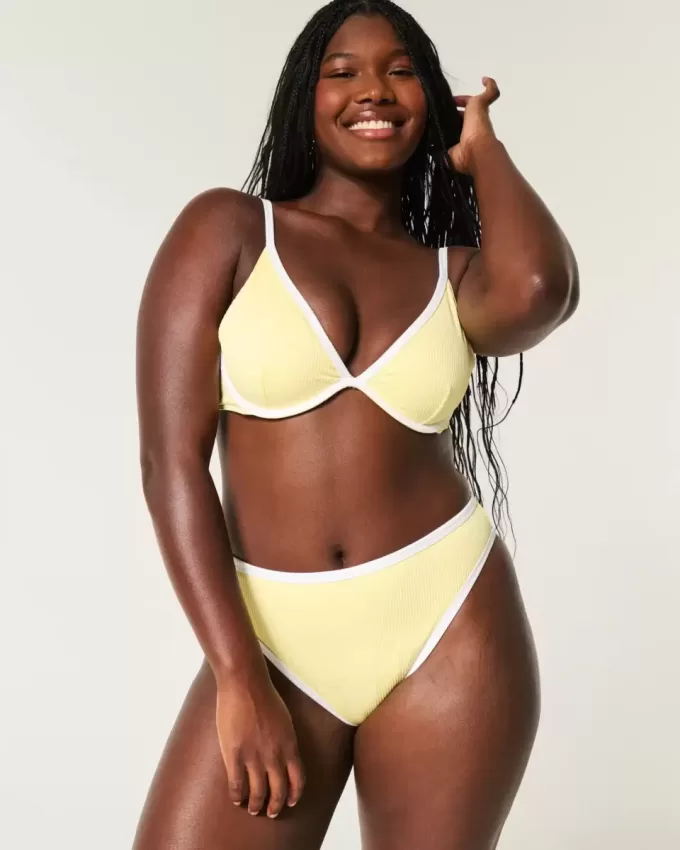 Braguita de bikini atrevida, de cintura alta y pierna alta con curvas Braguita de bikini atrevida, de cintura alta y pierna alta con curvas