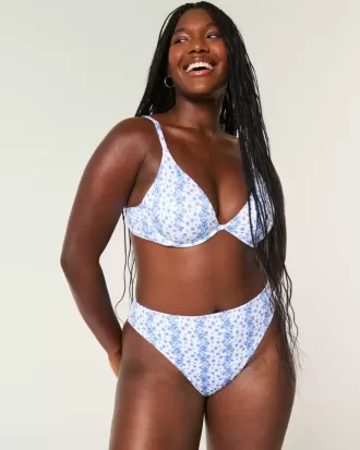 Braguita de bikini atrevida, de cintura alta y pierna alta con curvas Braguita de bikini atrevida, de cintura alta y pierna alta con curvas
