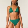 Braguita de bikini atrevida, de cintura alta y pierna alta con curvas Braguita de bikini atrevida, de cintura alta y pierna alta con curvas