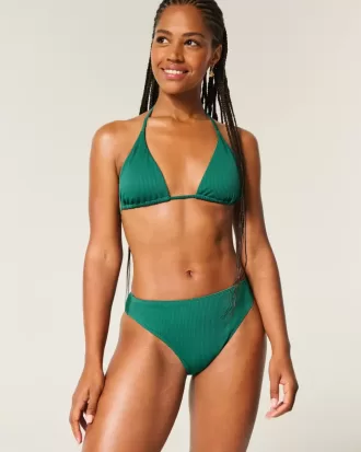 Braguita de bikini atrevida, de cintura alta y pierna alta con curvas