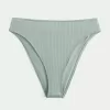Braguita de bikini atrevida, de cintura alta y pierna alta con curvas Braguita de bikini atrevida, de cintura alta y pierna alta con curvas