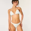 Braguita de bikini atrevida de pierna alta con tiras