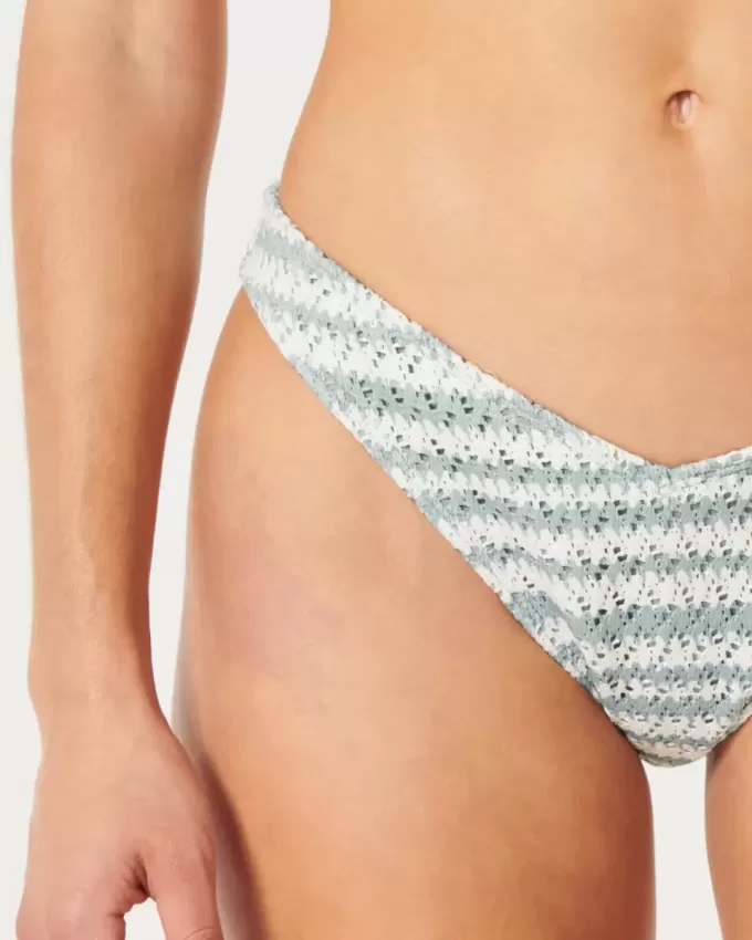 Braguita de bikini atrevida de pierna alta estilo crochet Braguita de bikini atrevida de pierna alta estilo crochet