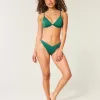 Braguita de bikini atrevida de pierna alta y canalé
