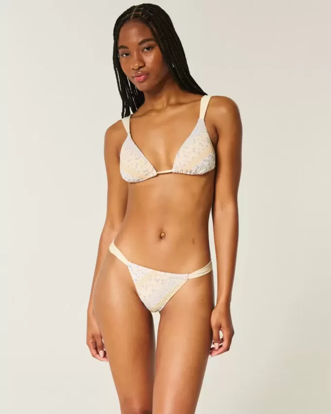 Braguita de bikini atrevida de pierna alta y fruncida Braguita de bikini atrevida de pierna alta y fruncida