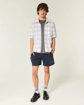 Camisa cuadrada de manga corta con bolsillo