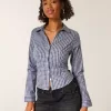 Camisa de popelina elástica con botones Camisa de popelina elástica con botones