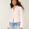 Camisa de popelina elástica con botones Camisa de popelina elástica con botones