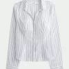 Camisa de popelina elástica con botones Camisa de popelina elástica con botones