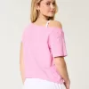 Camiseta gráfica de Snoopy con hombros descubiertos