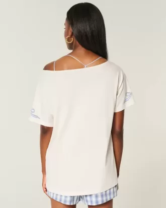 Camiseta gráfica extragrande con hombros descubiertos