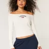Camiseta gráfica londinense con hombros descubiertos