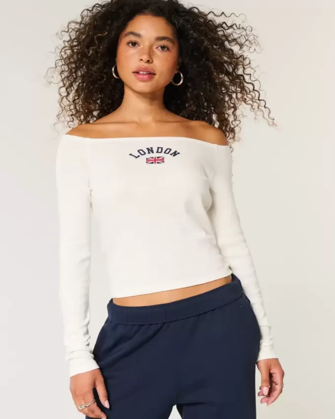 Camiseta gráfica londinense con hombros descubiertos