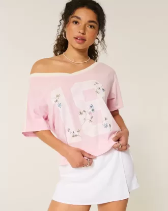 Camiseta universitaria extragrande con estampado floral y hombros descubiertos