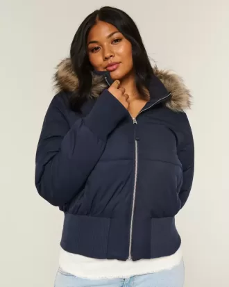 Chaqueta bomber acolchada con ribete de piel sintética