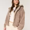 Chaqueta con cremallera de piel sintética rizada