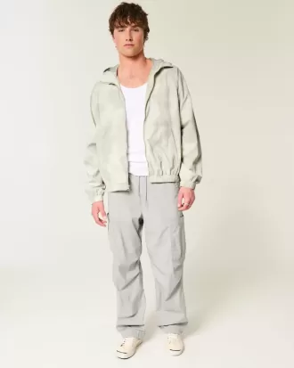 Chaqueta cortavientos con cremallera y estampado de camuflaje