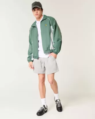 Chaqueta cortavientos con gráfico de golf