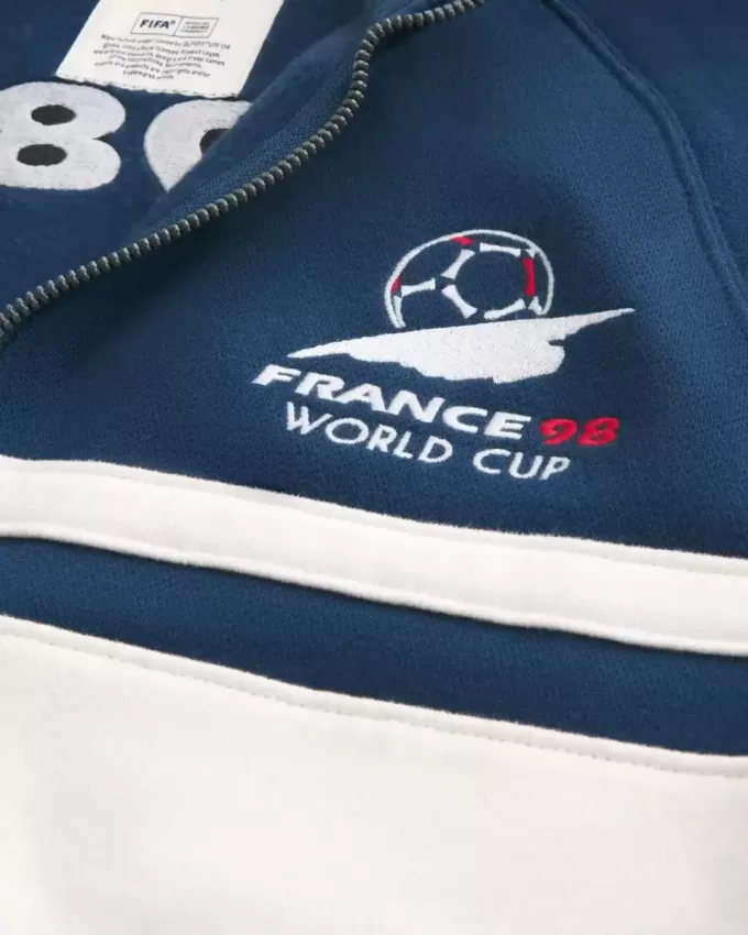 Chaqueta deportiva polar con estampado de la Copa Mundial de la FIFA Francia 1998 Chaqueta deportiva polar con estampado de la Copa Mundial de la FIFA Francia 1998