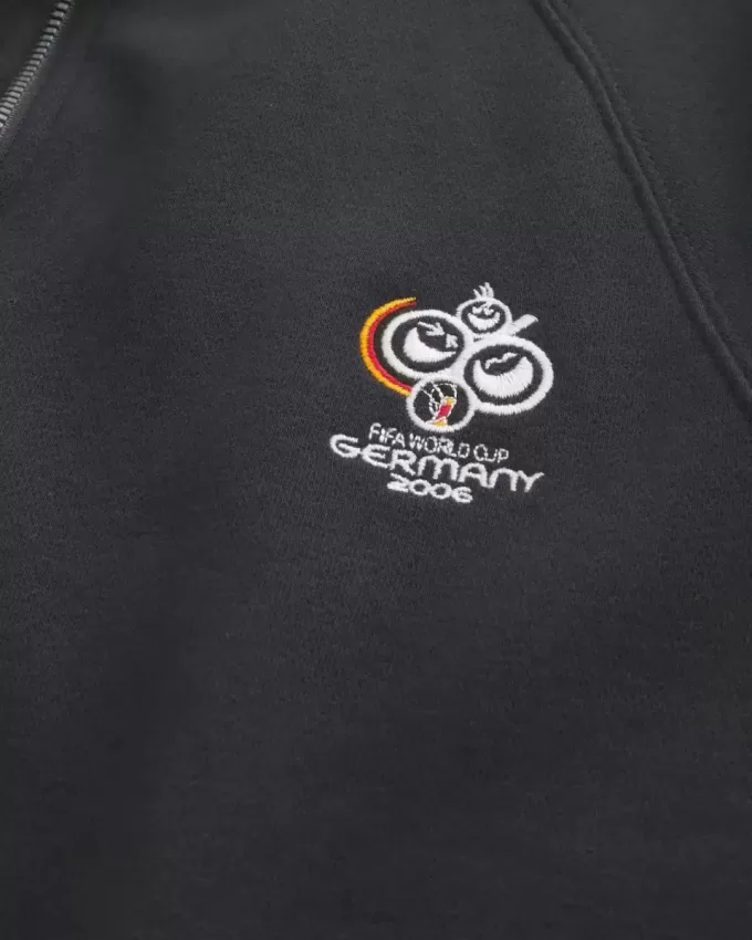 Chaqueta deportiva polar con estampado gráfico de la Copa Mundial de la FIFA Alemania 2006 Chaqueta deportiva polar con estampado gráfico de la Copa Mundial de la FIFA Alemania 2006