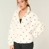 Gilly Hicks – Top con cremallera y bordado de sherpa Gilly Hicks – Top con cremallera y bordado de sherpa